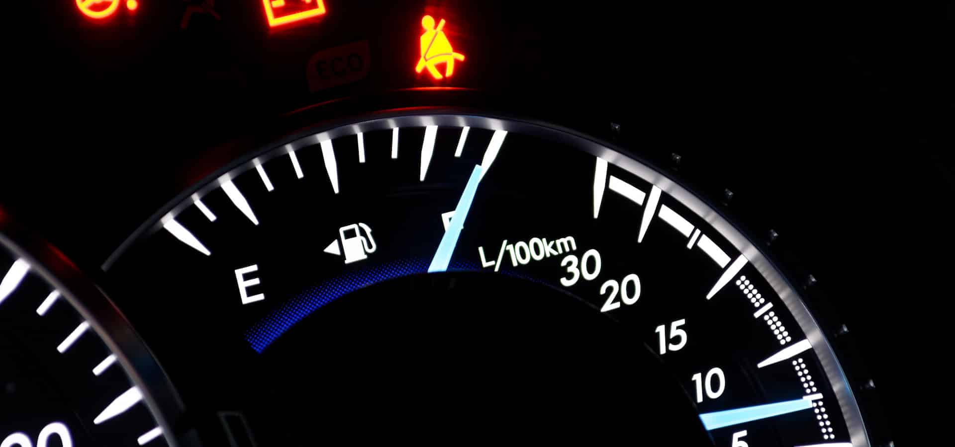 Car dashboard fuel gauge and consumption meter