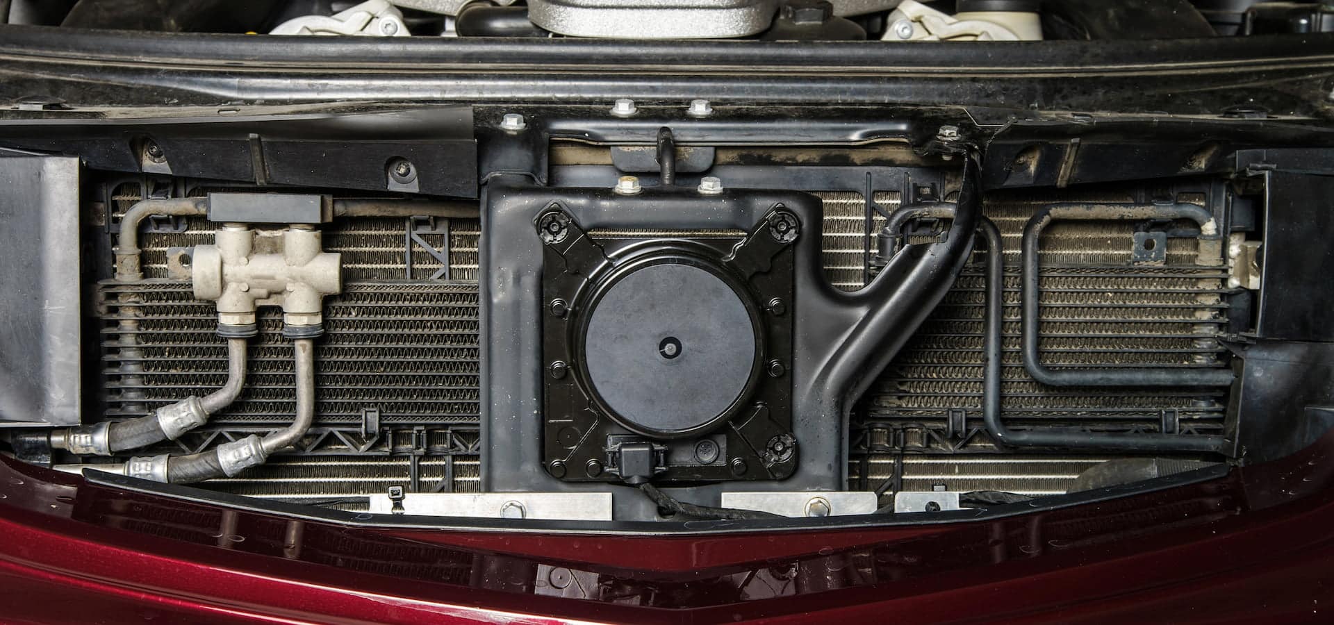 Exposed car radiator and front engine components