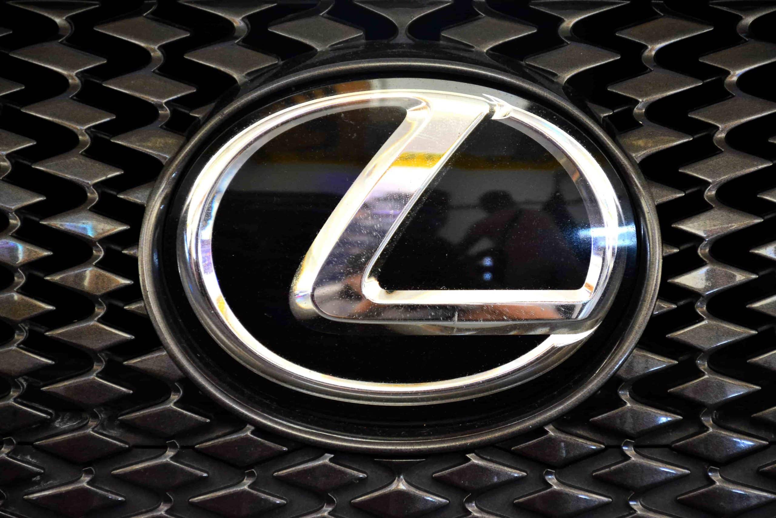 Lexus emblem on black car grille
